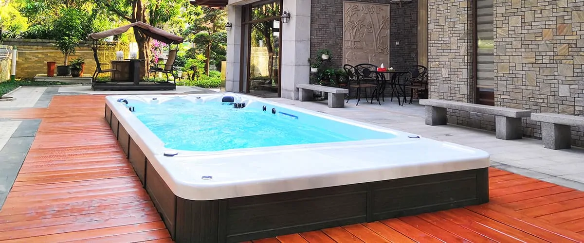 Endless Pool бесконечный бассейн с устройством противотока для плавания. Купить, установить свим спа бассейн с противотоком на террасе дома.
